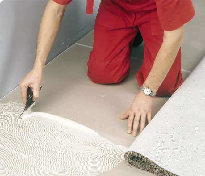 Czym przykleić wykładzinę dywanową? Najlepsze kleje i techniki klejenia